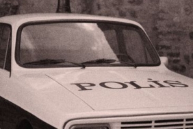 Alkollü sürücü polis aracına binerken kapıları karıştırdı