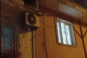 İzmir'de kedi elektrik tellerine düştü, mahalleli kurtardı