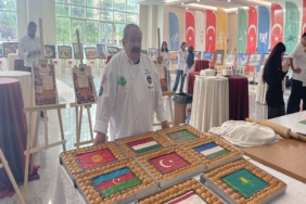 TÜRK BAKLAVASINI 'BAKLAVAKİ' İSMİNDEN KURTARMAK İÇİN DÜNYANIN EN BÜYÜK BAKLAVASINI YAPTI DÜNYANIN EN BÜYÜK BAKLAVASINI YAPTI, GUİNNESS DÜNYA REKORLARI'NA GİRDİ